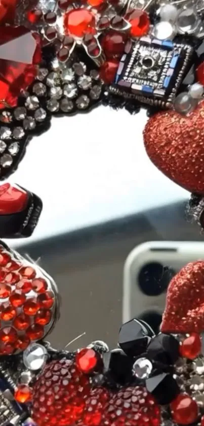 Heart-shaped rhinestone phone decor with a mirror reflection background.