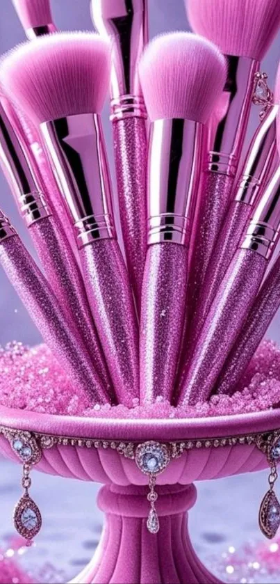 Elegant pink makeup brushes with glittering details.