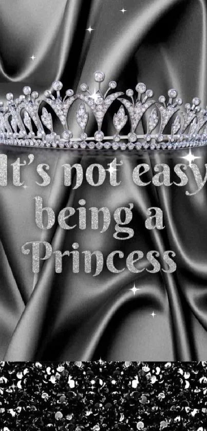 Black satin background with crown and princess quote.