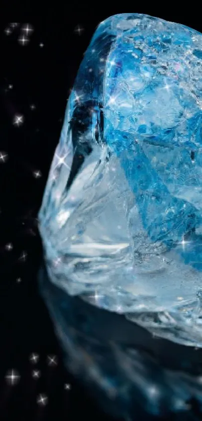 Gleaming blue diamond resting on a black surface, surrounded by sparkling highlights.