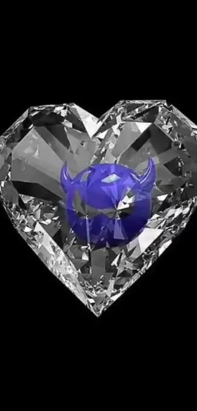 Heart-shaped diamond with blue core on black background wallpaper.