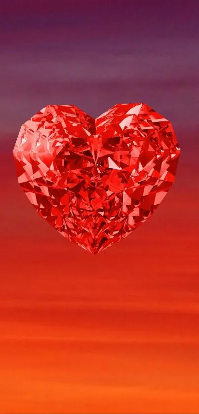 Gleaming red diamond heart on sunset gradient background.