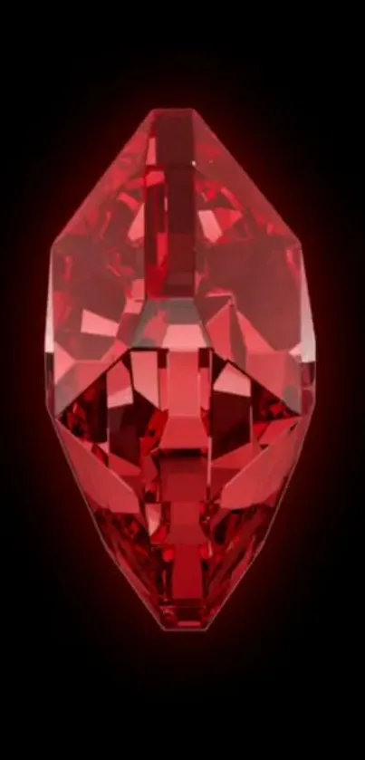 Gleaming red gemstone on black background wallpaper.