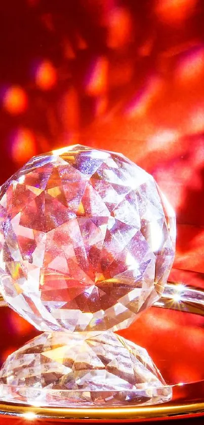 Luminous crystal ball on a scarlet background with vibrant reflections.