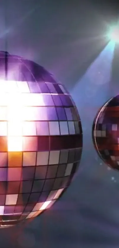 Shiny disco balls with vibrant purple glow.