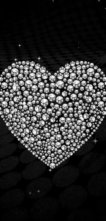 Heart-shaped diamond design on black background wallpaper.