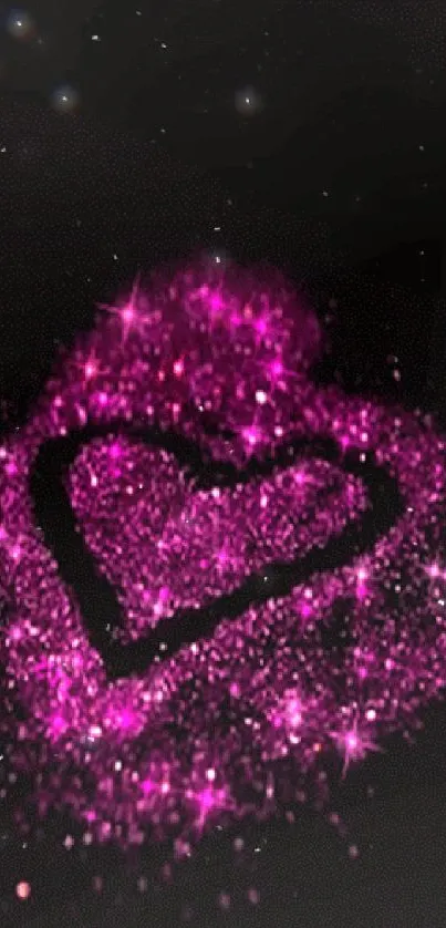 Pink glitter heart on black background wallpaper.