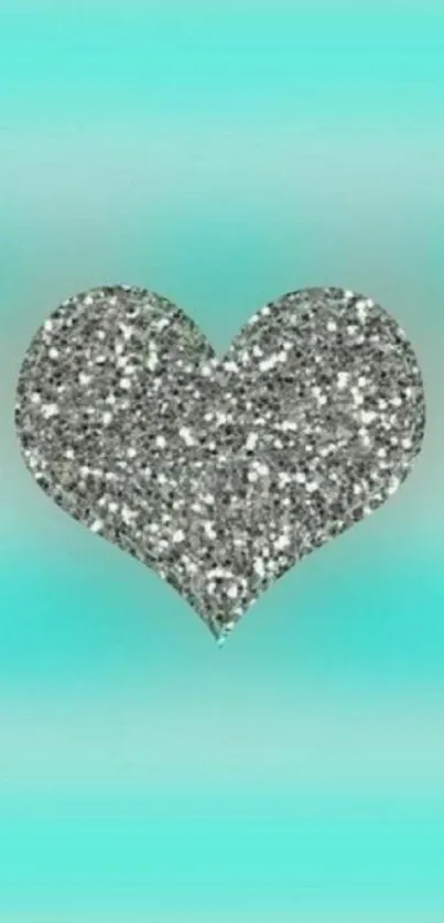 Glittery heart on a teal gradient background