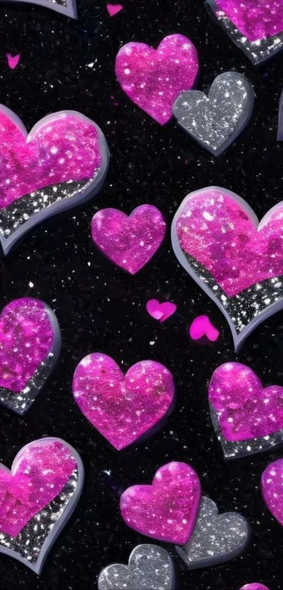 Glittering pink and silver hearts on black background.