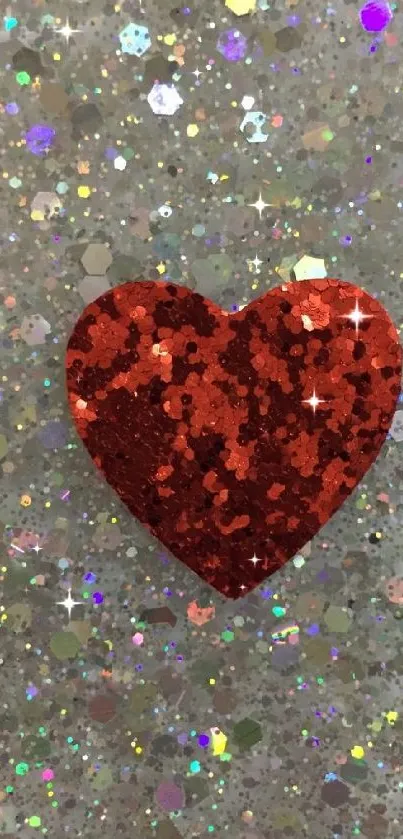 Red glitter heart with shimmering confetti background.