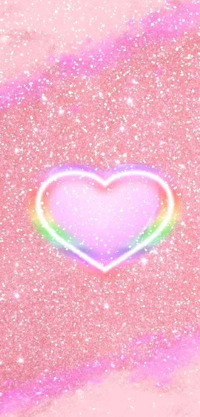 Sparkling pink heart with rainbow glow on glittery pink background.