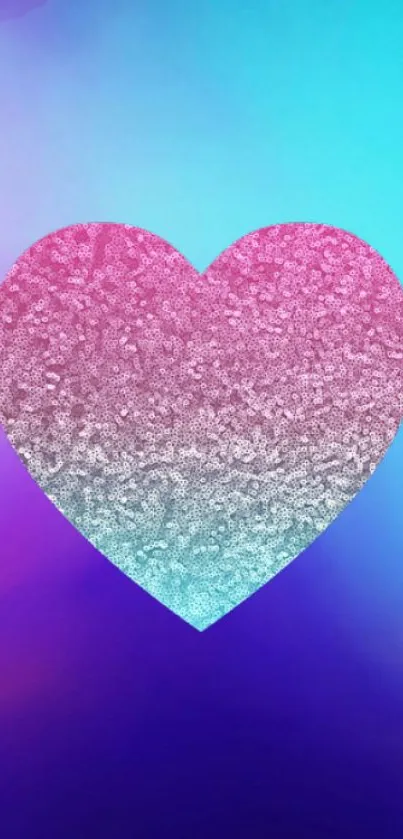 Glittery heart with blue and pink gradient on colorful background.