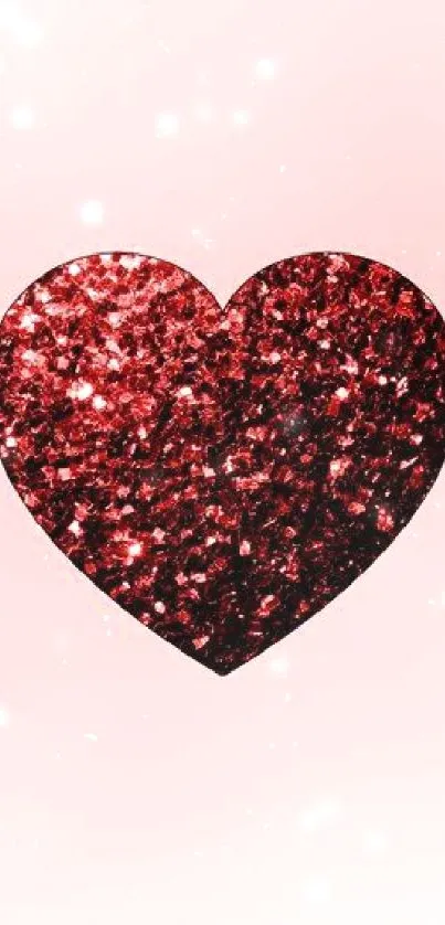 Sparkling red glitter heart on a soft pink background wallpaper.