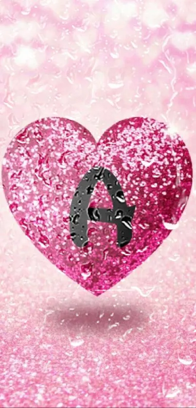 Sparkling pink heart with letter 'A' on glitter background.