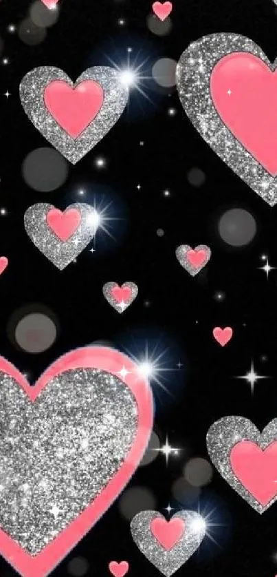 Mobile wallpaper with pink glitter hearts on black.