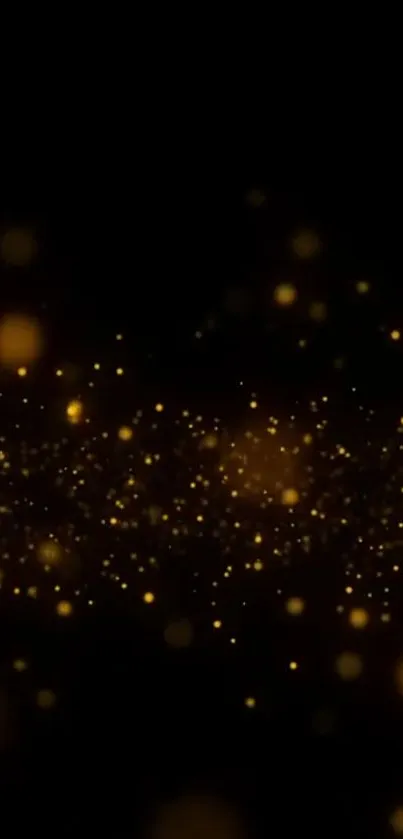 Golden bokeh particles on black mobile wallpaper.