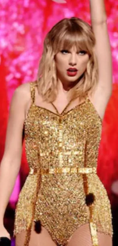 Performer in gold outfit with vibrant pink backdrop.