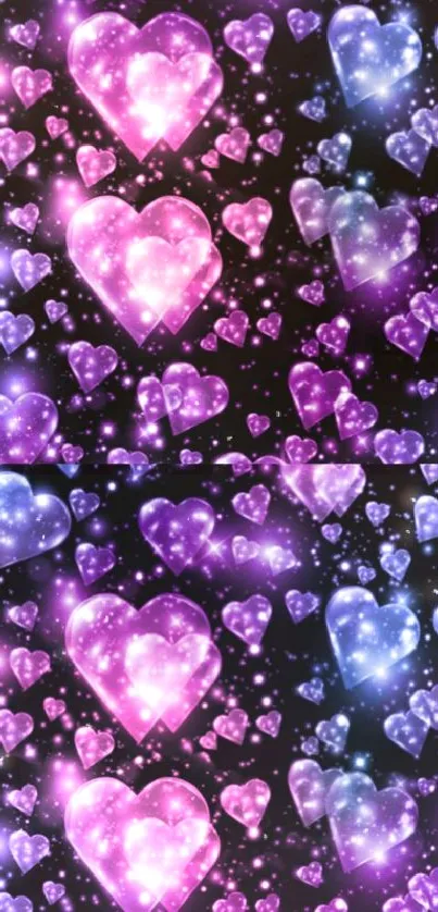 Glittering pink and purple heart galaxy wallpaper for mobile.