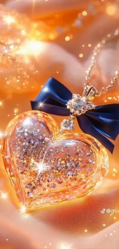 Heart-shaped glitter necklace on golden fabric.