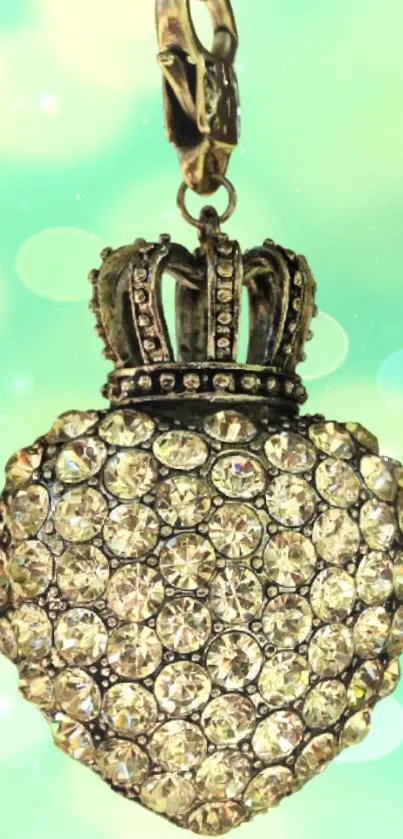 Diamond-studded heart with crown on pastel green background.