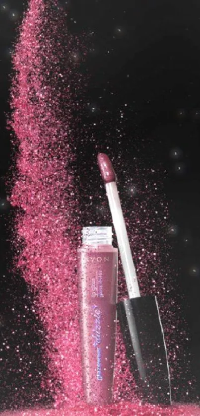 Pink glitter lip gloss with sparkling particles on black background.