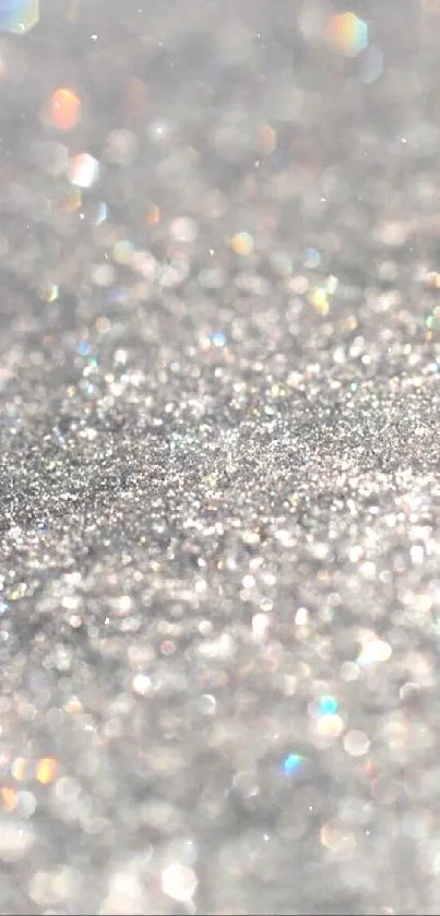 Glittering silver sparkles on a wallpaper.