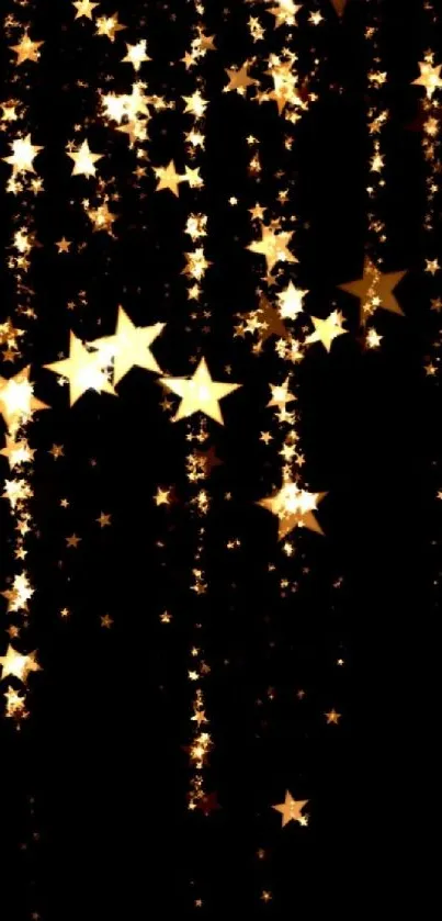 Glittering golden stars cascade on a black background wallpaper.