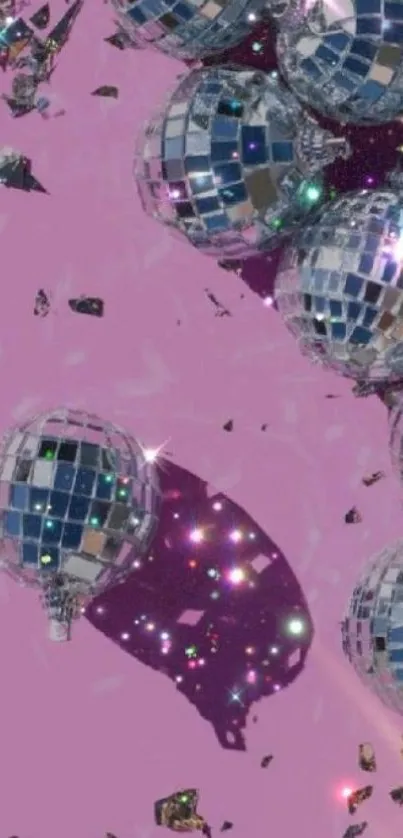 Disco ball wallpaper with pink background.