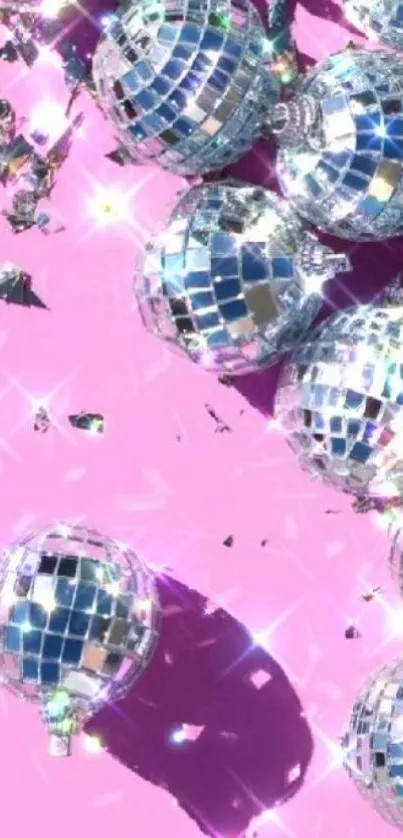 Sparkling disco balls on hot pink background.