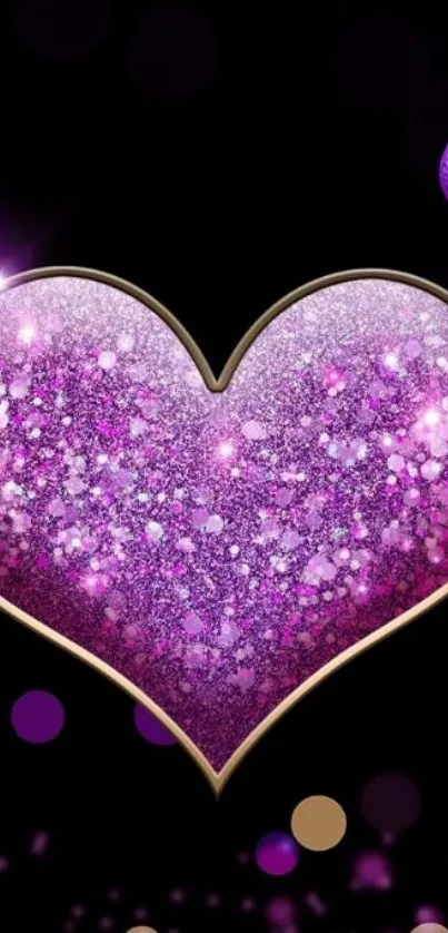 Purple glittering heart on black background wallpaper