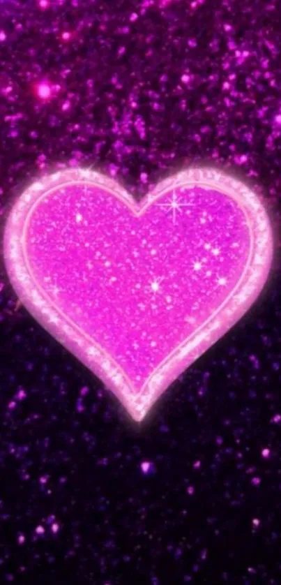 Glittery pink heart on a sparkling background wallpaper.