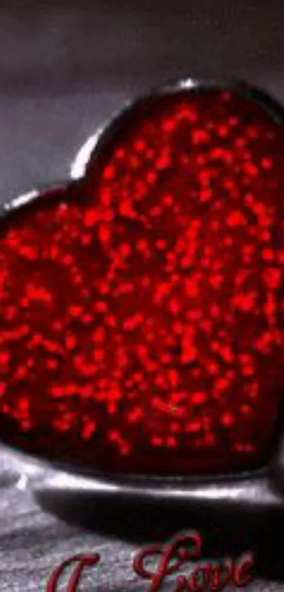 Glittery red heart design on a gray background.