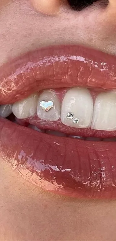 Close-up of glossy lips and gem-decorated teeth.