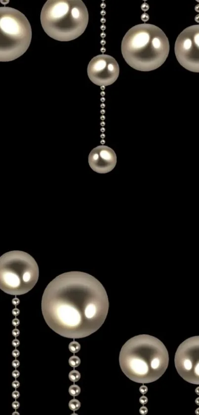 Mobile wallpaper with glossy pearl beads on black background.