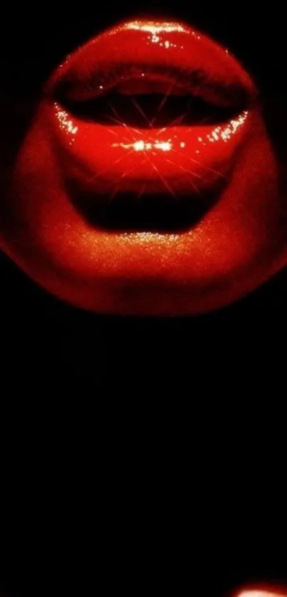 Mobile wallpaper with striking glossy red lips glowing in the dark.