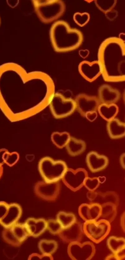 Glowing orange hearts on a dark background