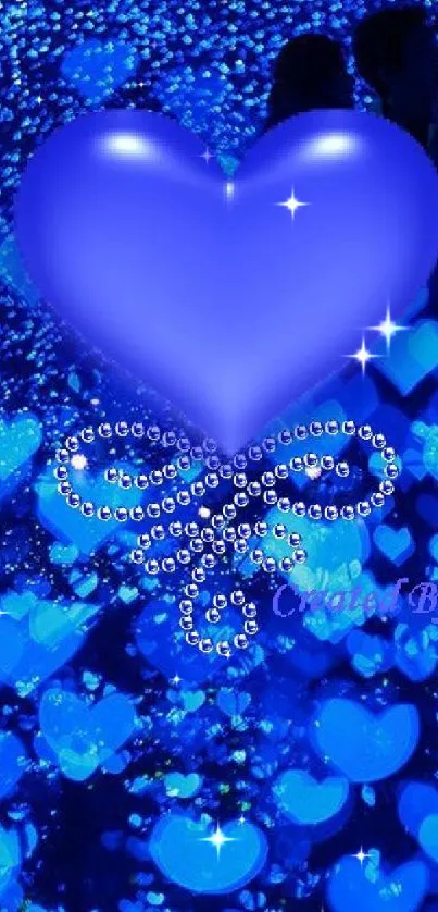 Glowing blue heart wallpaper with bokeh effect.