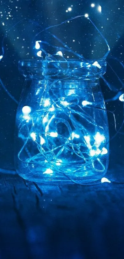 Glowing blue fairy lights in a jar against a night sky backdrop.