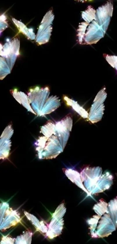 Glowing butterflies on dark background wallpaper.