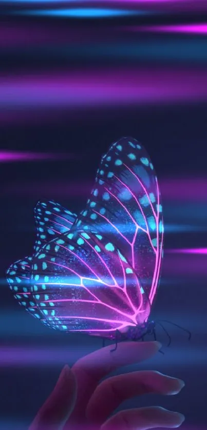 Luminous butterfly resting on a hand in a dark, aesthetic setting.