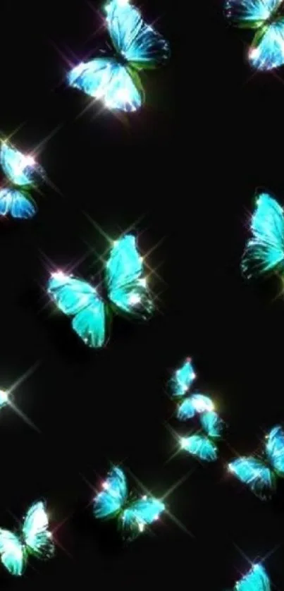 Vibrant turquoise glowing butterfly wallpaper on black background.