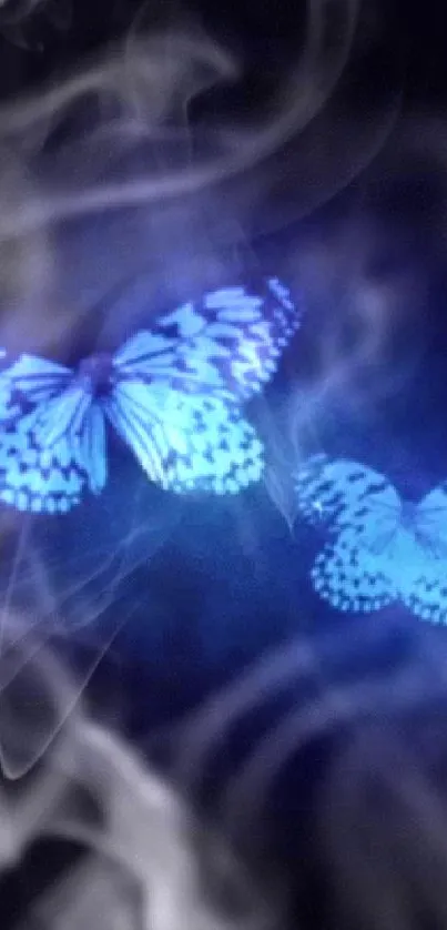 Illuminated blue butterflies on dark background.