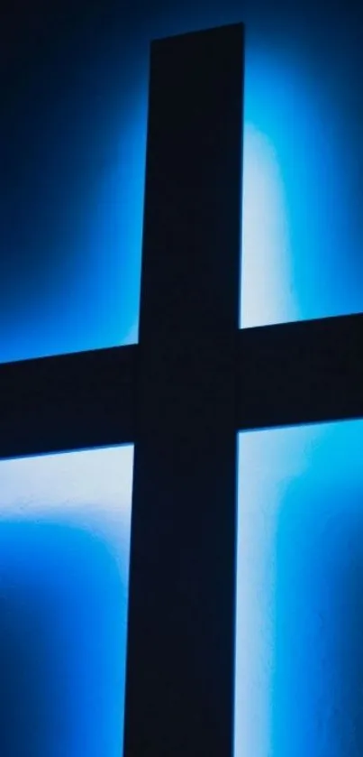 Glowing cross with a blue halo on phone wallpaper.