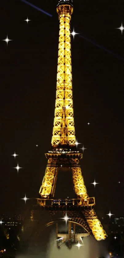 Eiffel Tower glowing at night with stars, Paris.