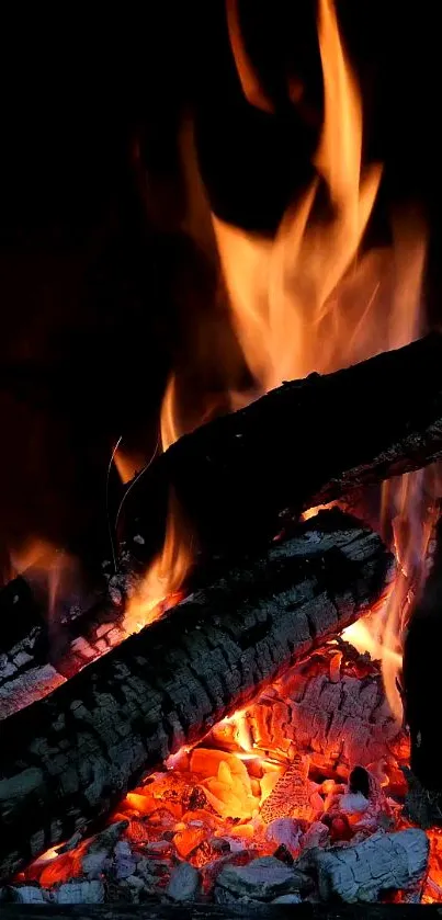 A vivid fire and embers mobile wallpaper, capturing the warmth and glow of burning wood.