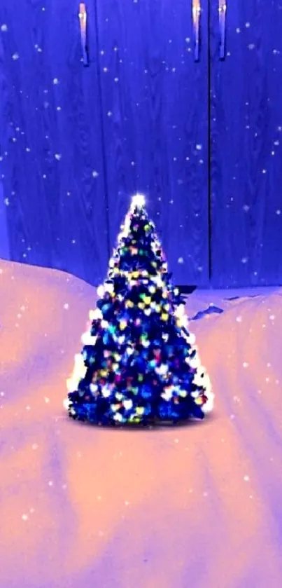 Colorful Christmas tree with glowing lights on a blue background.