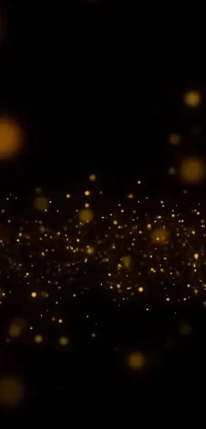 Luxurious glowing gold particles on dark background