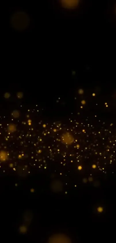 Glowing gold particles on a dark background, creating an elegant mobile wallpaper.