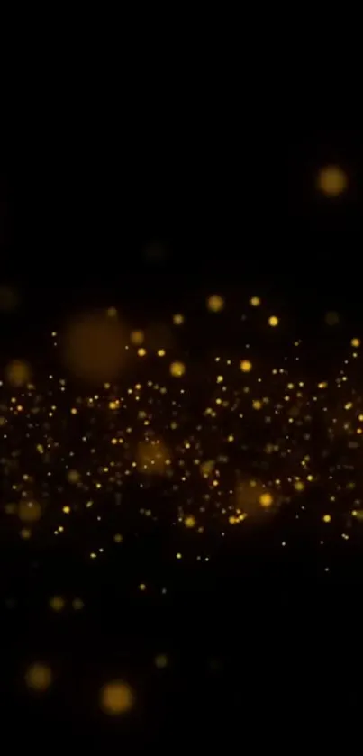 Glowing golden particles on a dark background, creating an elegant mobile wallpaper.