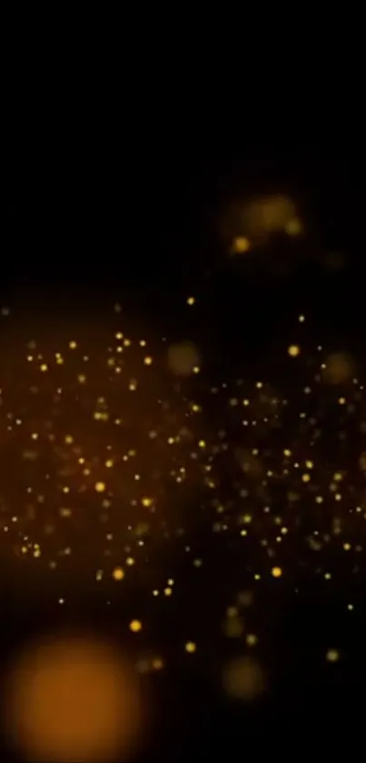 Glowing golden particles on dark background for mobile wallpaper.